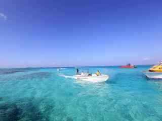 塞班岛海上汽艇唯美海洋风景图片高清桌面壁纸